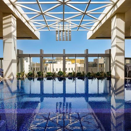 Millennium Place Doha Exteriör bild The rooftop pool at the Four Seasons Hotel, Cairo