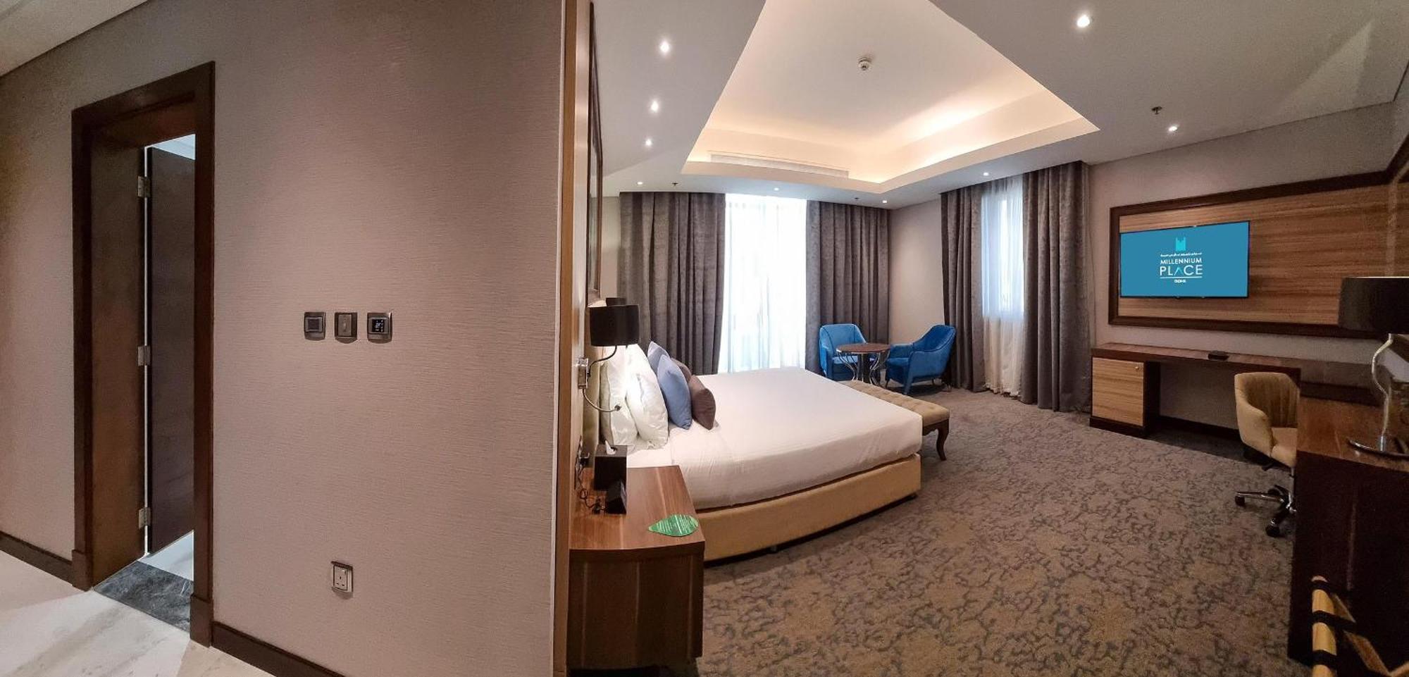 Millennium Place Doha Exteriör bild A bedroom at the hotel