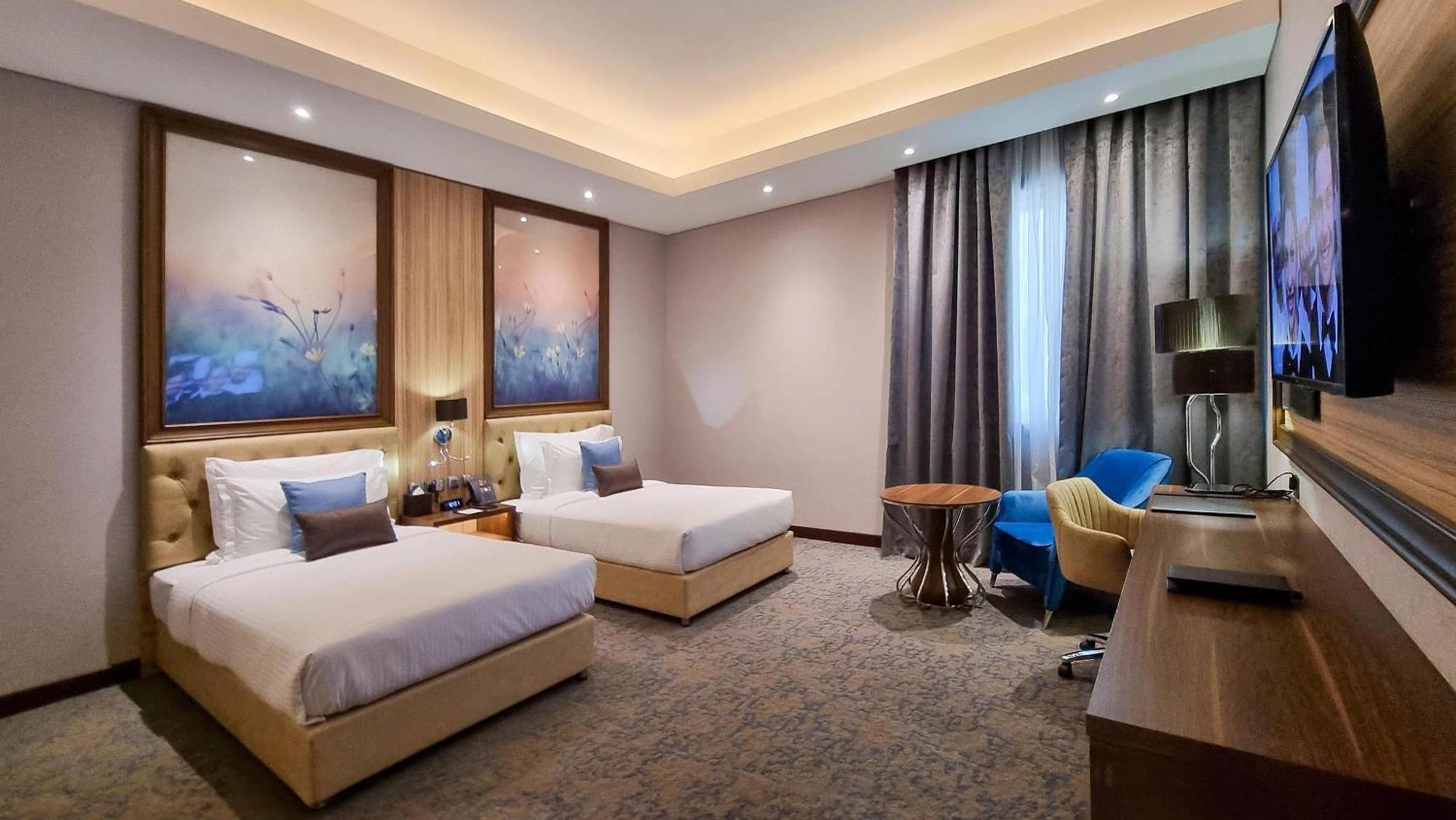 Millennium Place Doha Exteriör bild Deluxe Twin