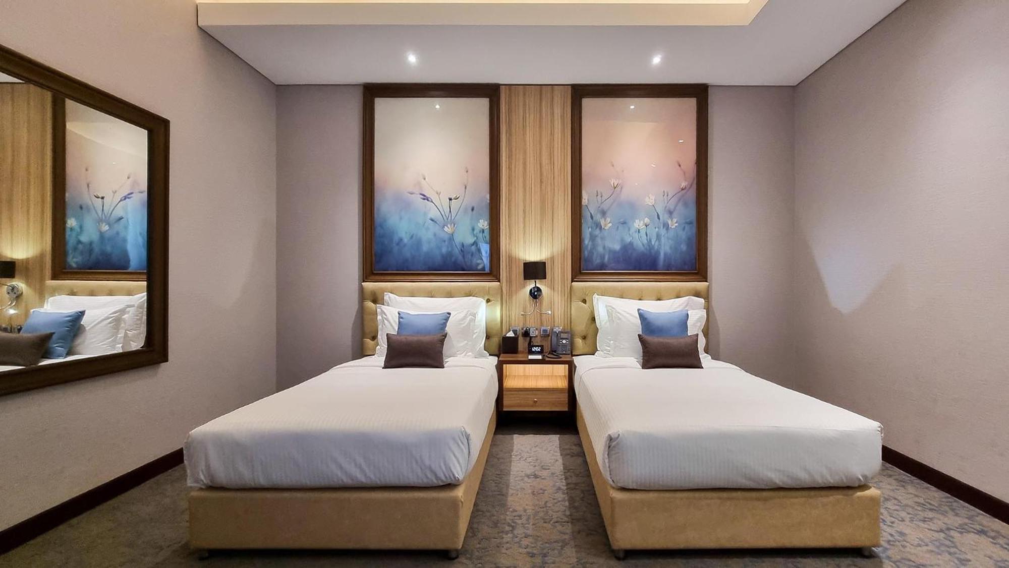 Millennium Place Doha Exteriör bild Deluxe Twin